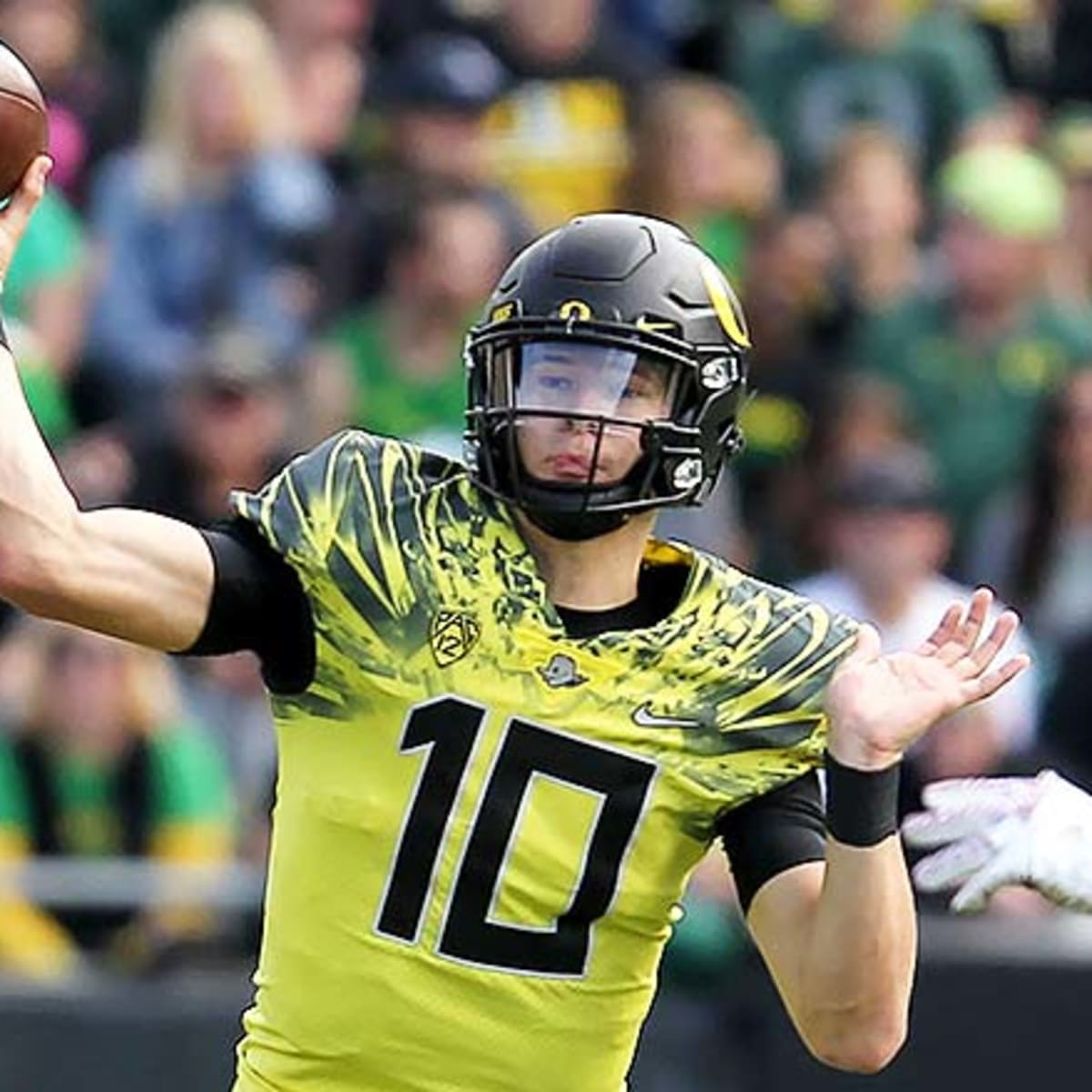 Lids Justin Herbert Oregon Ducks Fanatics Authentic Unsigned Yellow Jersey  Running with Ball Photograph