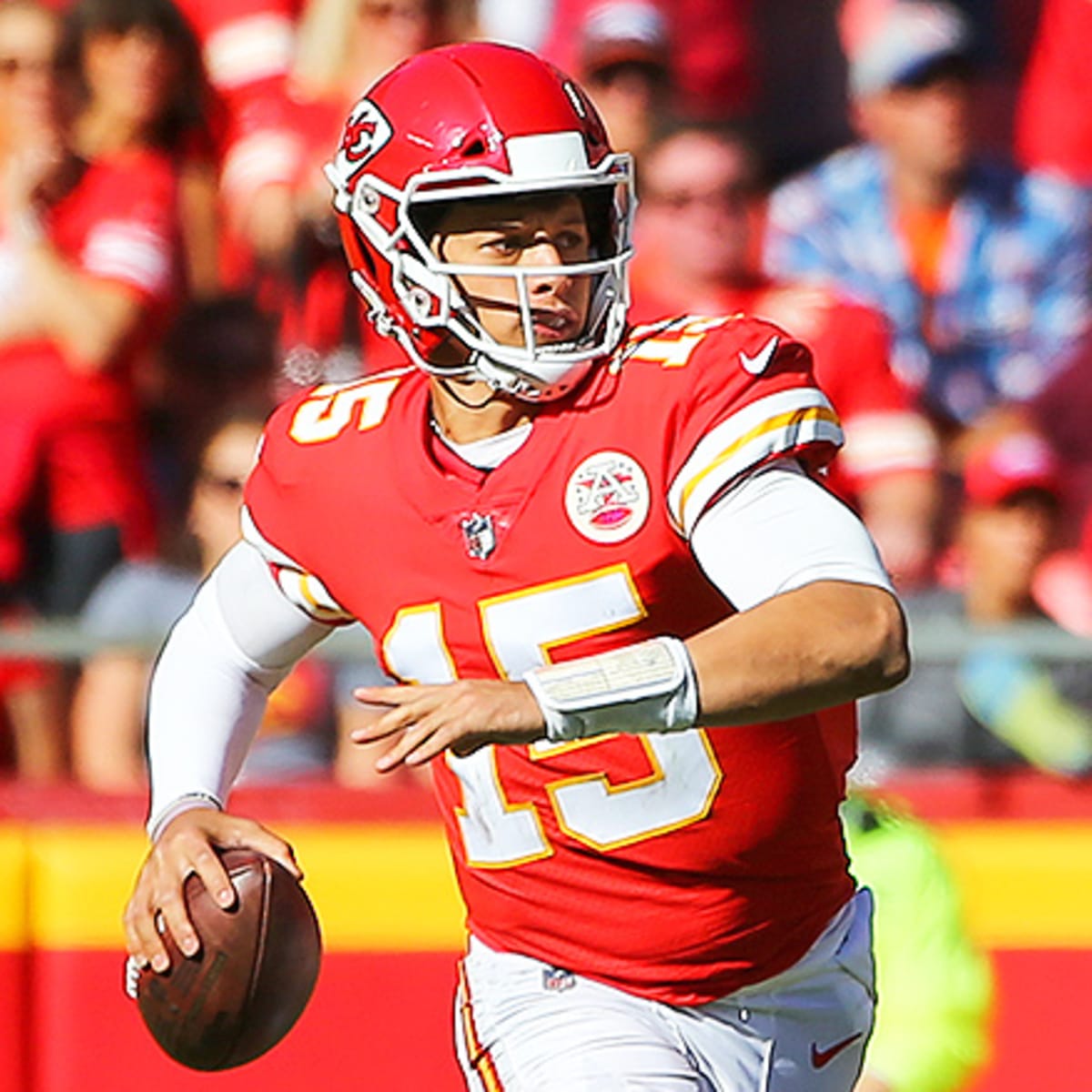 Kansas City Chiefs quarterback Joe Montana holds his head after