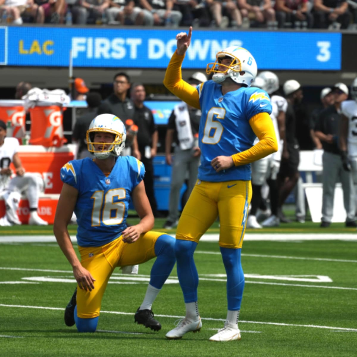 Injured Hopkins kicks OT game-winner as Chargers beat stumbling