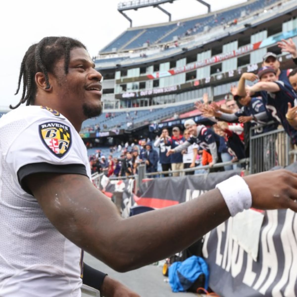 Young Ravens Fan Had Priceless Reaction to High-Fiving Lamar Jackson -  Sports Illustrated