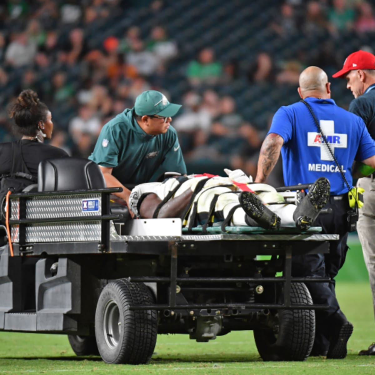 Two Eagles players stretchered off field after neck injuries during game