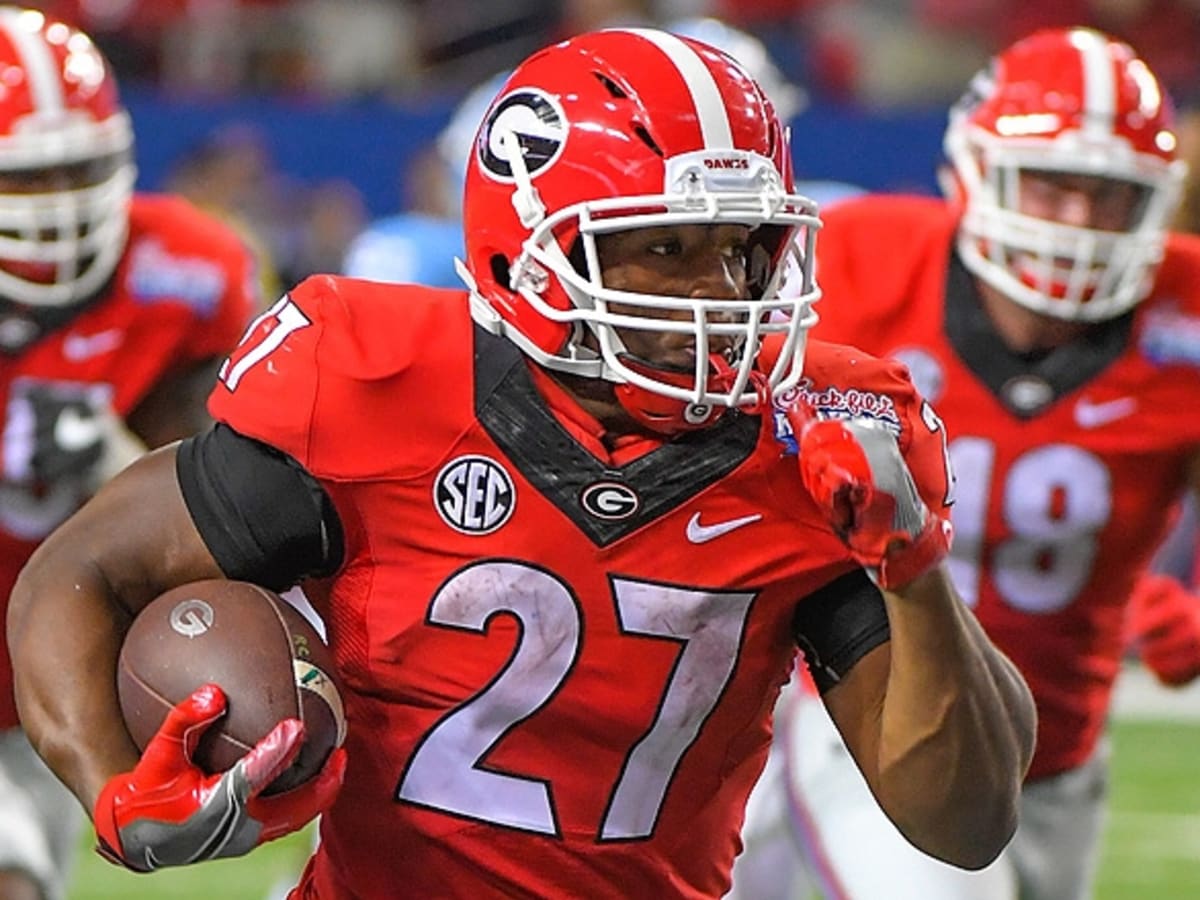 Nick Chubb Georgia Bulldogs Unsigned Escapes Tackle Photograph