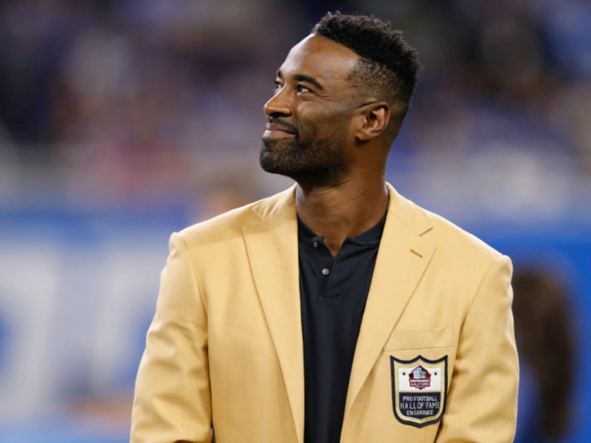 Pro Football Hall of Fame wide receiver Calvin Johnson receives