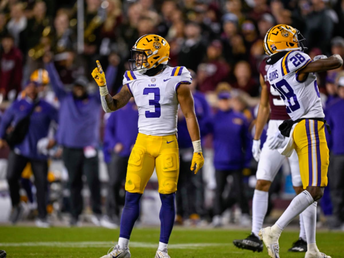 Tyrann Mathieu shows his support for LSU's Greg Brooks during