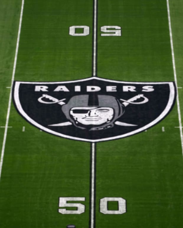 The Raiders' logo at midfield.