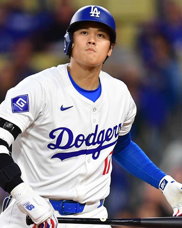 Los Angeles Dodgers designated hitter Shohei Ohtani (17) reacts after striking out against the San Francisco Giants during the first inning at Dodger Stadium.