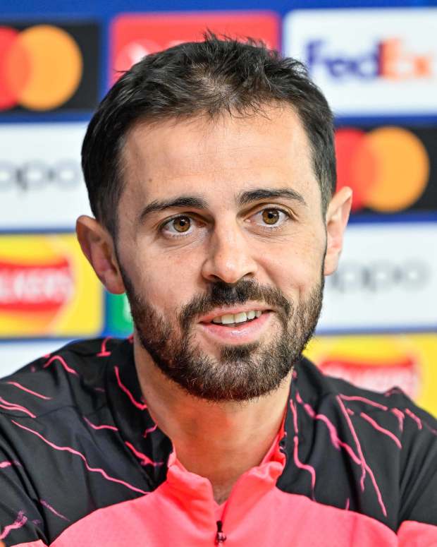 Bernardo Silva pictured speaking at a press conference on the eve of Manchester City's UEFA Champions League quarter-final second leg against Real Madrid in April 2024