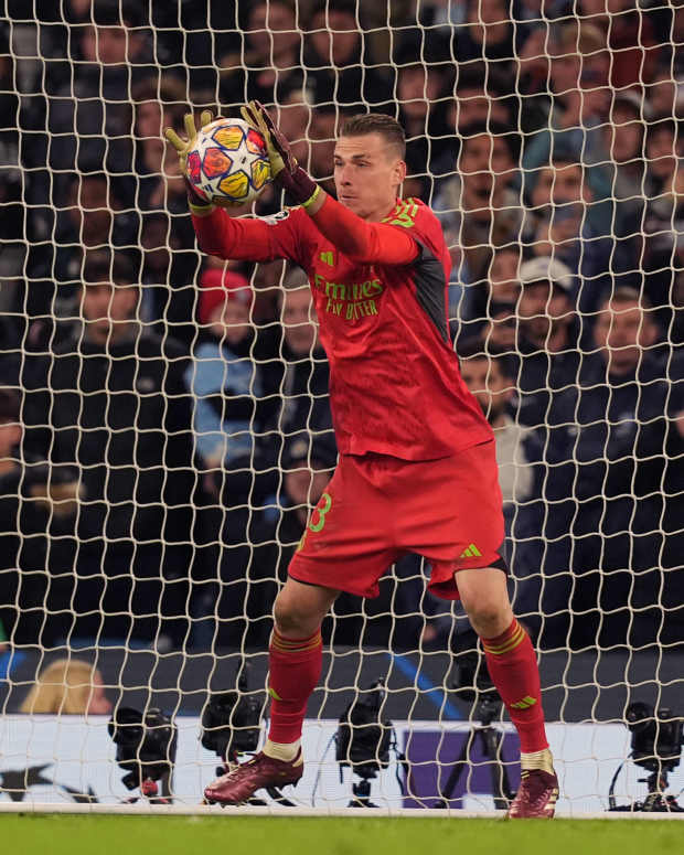 Goalkeeper Andriy Lunin pictured saving a penalty kick from Bernardo Silva during Real Madrid's shootout win over Manchester City in the UEFA Champions League quarter-finals in April 2024