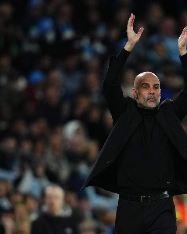 Manchester City manager Pep Guardiola pictured applauding his players during a game against Real Madrid in April 2024