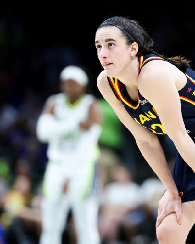 Indiana Fever guard Caitlin Clark (22) reacts during the second half against the Dallas Wings at College Park Center. 