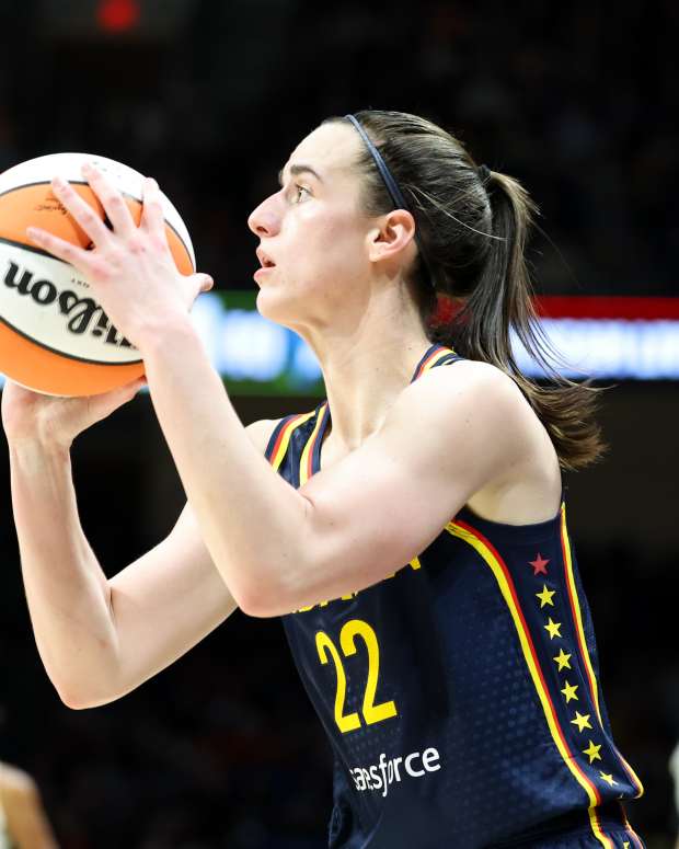 May 3, 2024; Dallas, Texas, USA; Indiana Fever guard Caitlin Clark (22) shoots during the second quarter against the Dallas Wings at College Park Center.