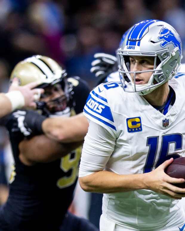 Dec 3, 2023; New Orleans, Louisiana, USA; Detroit Lions quarterback Jared Goff (16) rolls out the pocket to pass the ball against the New Orleans Saints during the second half at the Caesars Superdome.