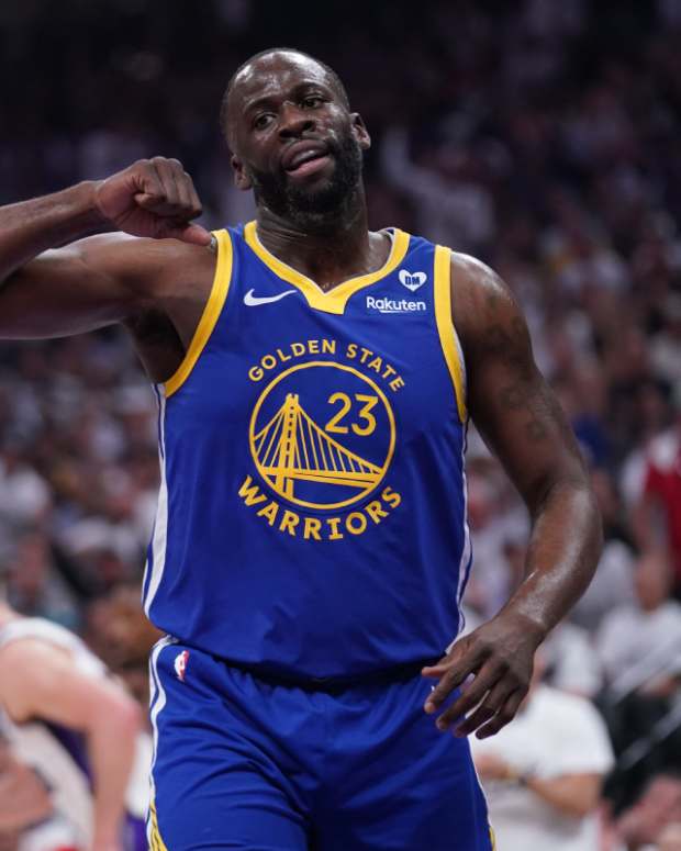 Golden State Warriors forward Draymond Green (23) reacts after a play against the Sacramento Kings in the first quarter during a play-in game of the 2024 NBA playoffs.