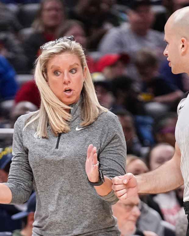 Indiana Fever Christie Sides talks to the referee after a foul Thursday, May 9, 2024, during the preseason game against the Atlanta Dream at Gainbridge Fieldhouse in Indianapolis.