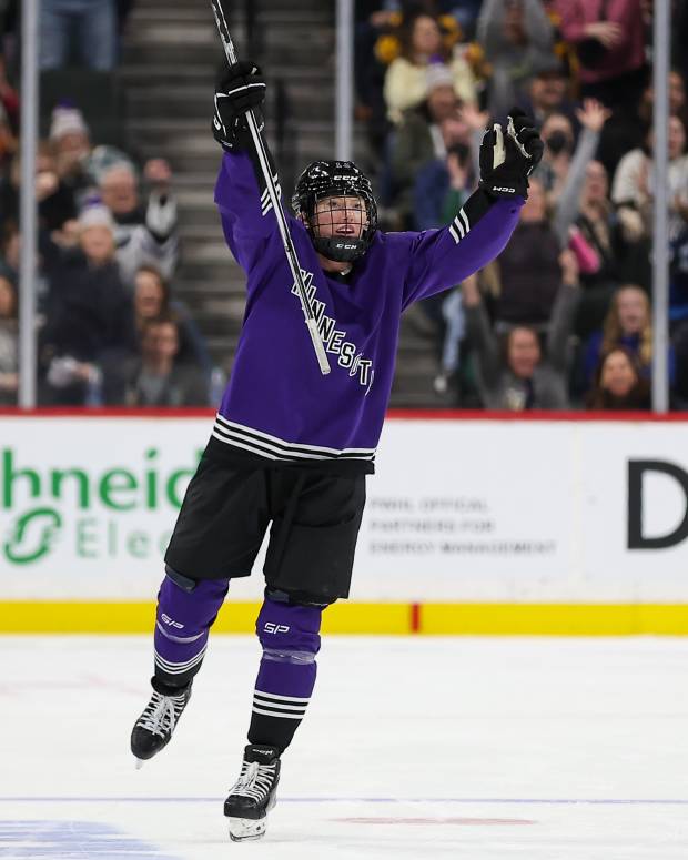 Jan 6, 2024; St. Paul, Minnesota, USA; Minnesota forward Grace Zumwinkle (13) celebrates her hat trick during the third period against Montreal in a PWHL ice hockey game at XCel Energy Center. Zumwinkle scored the first hat trick in PWHL history. Mandatory Credit: Matt Krohn-USA TODAY Sports  