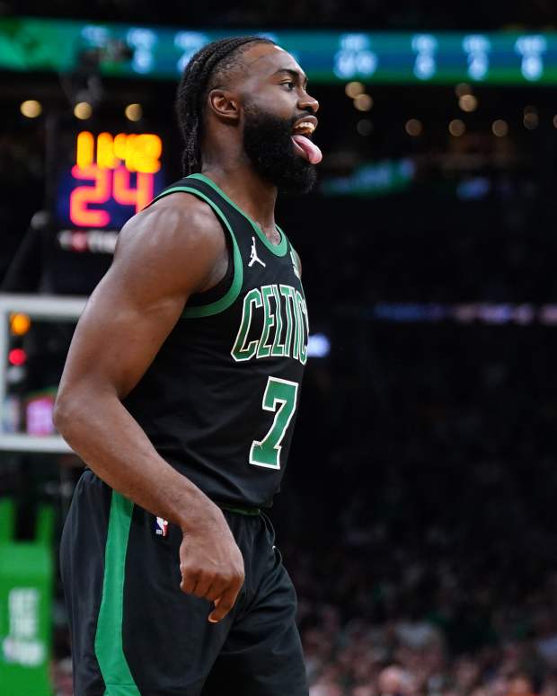 May 23, 2024; Boston, Massachusetts, USA; Boston Celtics guard Jaylen Brown (7) reacts after making a three point basket against the Indiana Pacers in the first half during game two of the eastern conference finals for the 2024 NBA playoffs at TD Garden.