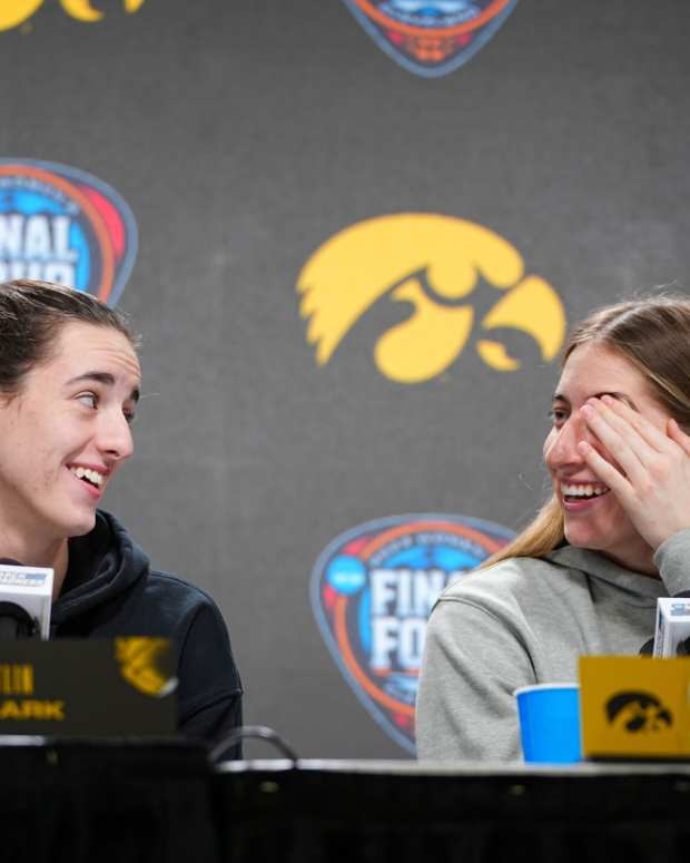 Iowa Hawkeyes guard Caitlin Clark (22) and Iowa Hawkeyes guard Kate Martin (20) take questions at Rocket Mortgage Arena, Thursday, April 4, 2024 in Cleveland.