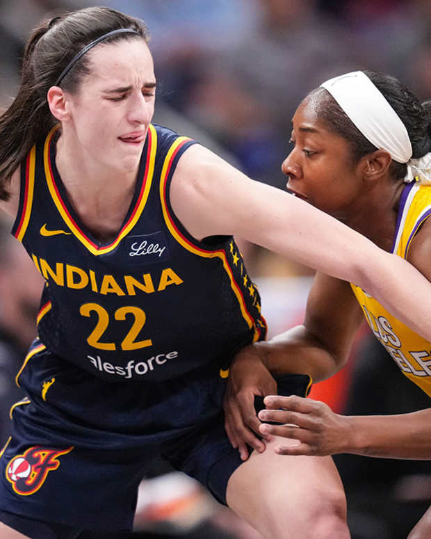 Indiana Fever guard Caitlin Clark dribbles during her team’s game against the Los Angeles Sparks on May 28, 2024.