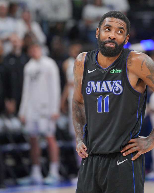 May 24, 2024; Minneapolis, Minnesota, USA; Dallas Mavericks guard Kyrie Irving (11) reacts in the fourth quarter against the Minnesota Timberwolves in game two of the western conference finals for the 2024 NBA playoffs at Target Center. Mandatory Credit: Brad Rempel-USA TODAY Sports  