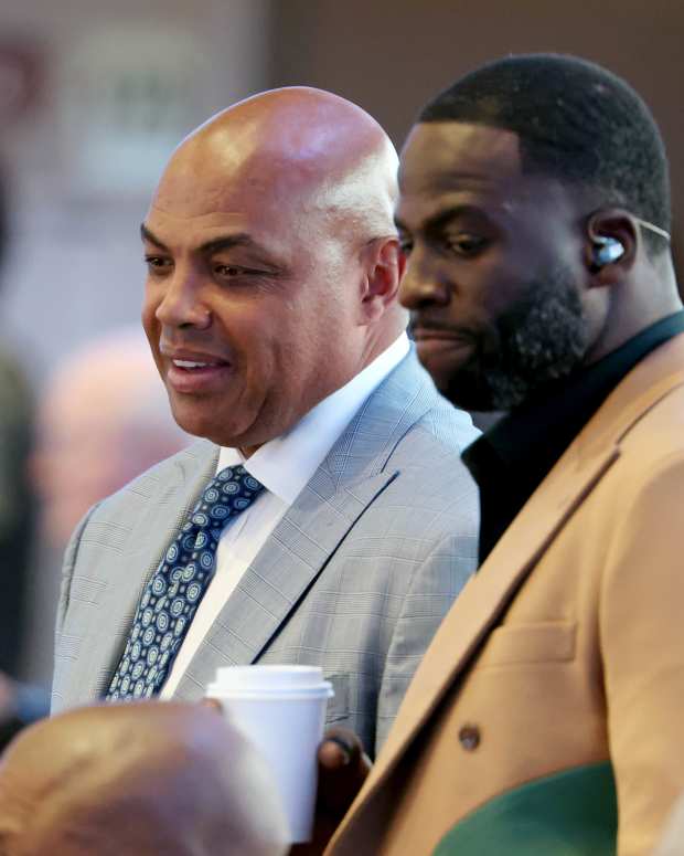 May 26, 2024; Dallas, Texas, USA; Charles Barkley (left) and Draymond Green (right) look on in the first half between the Dallas Mavericks and the Minnesota Timberwolves during game three of the western conference finals for the 2024 NBA playoffs at American Airlines Center. Mandatory Credit: Kevin Jairaj-USA TODAY Sports