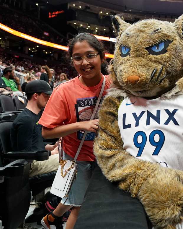 May 13, 2023; Toronto, Ontario, Canada; The Minnesota Lynx mascot poses with a fan before a game against the Chicago Sky at Scotiabank Arena. Mandatory Credit: John E. Sokolowski-USA TODAY Sports  