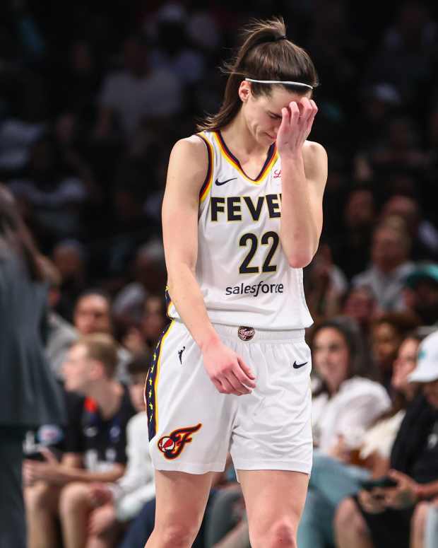 Jun 2, 2024; Brooklyn, New York, USA; Indiana Fever guard Caitlin Clark (22) walks back to the bench in the third quarter against the New York Liberty at Barclays Center.