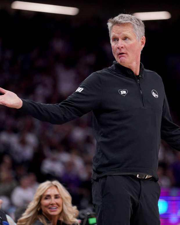 Golden State Warriors head coach Steve Kerr looks towards the team bench after a foul call during action against the Sacramento Kings in the fourth quarter during a play-in game of the 2024 NBA playoffs at the Golden 1 Center.