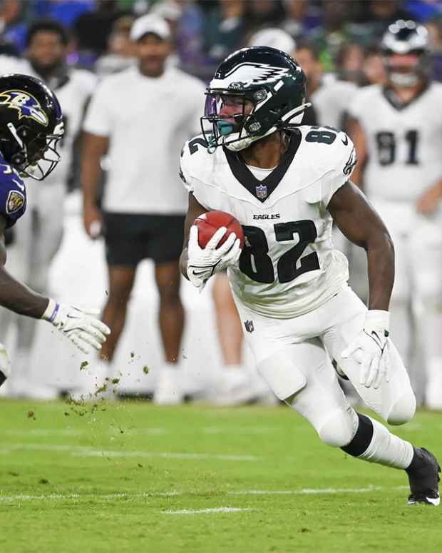 Aug 9, 2024; Baltimore, Maryland, USA; Philadelphia Eagles wide receiver Ainias Smith (82) returns a punt as Baltimore Ravens running back Owen Wright (36) defends during the second half of a preseason game at M&T Bank Stadium. Mandatory Credit: Tommy Gilligan-USA TODAY Sports