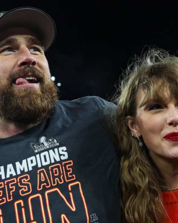 BALTIMORE, MARYLAND - Travis Kelce #87 of the Kansas City Chiefs (L) celebrates with Taylor Swift after defeating the Baltimore Ravens in the AFC Championship Game at M&T Bank Stadium