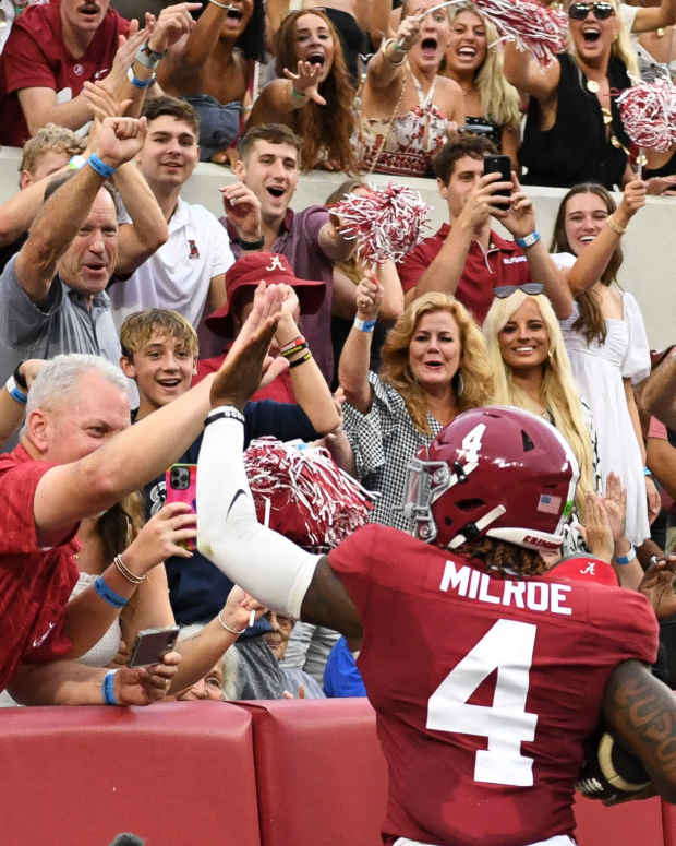 Alabama Crimson Tide quarterback Jalen Milroe (4) celebrates with fans.