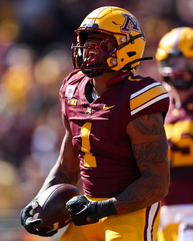 Sep 7, 2024; Minneapolis, Minnesota, USA; Minnesota Golden Gophers running back Darius Taylor (1) celebrates his touchdown against the Rhode Island Rams during the first half at Huntington Bank Stadium