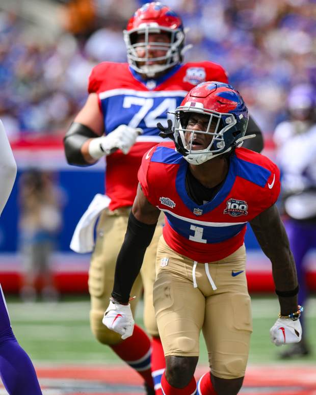 New York Giants wide receiver Malik Nabers (1) reacts after making a catch against the Minnesota Vikings during the second half at MetLife Stadium. 