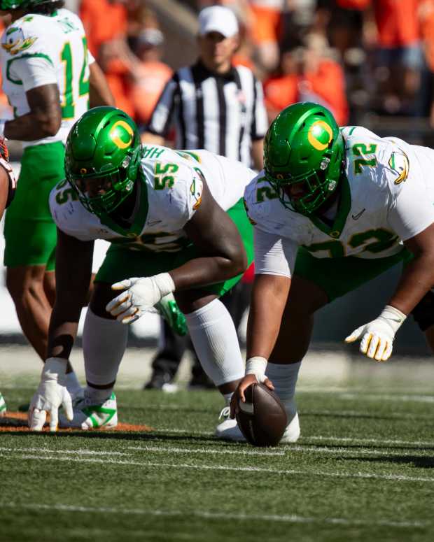 Titans of the Trenches: Iapani Laloulu and Marcus Harper II take their stance against Oregon State. Laloulu said a commitment to the basics fueled a standout performance in Corvallis.