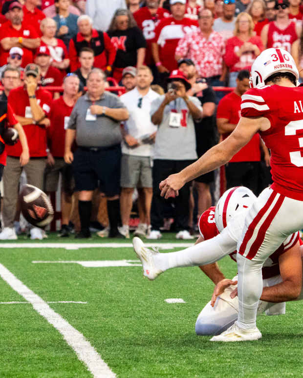 Sep 7, 2024; Lincoln, Nebraska, USA; Nebraska Cornhuskers place kicker Tristan Alvano (30) kicks a PAT against the Colorado Buffaloes during the second quarter at Memorial Stadium.