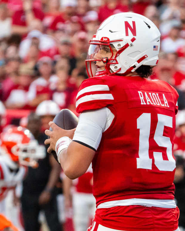 Sep 20, 2024; Lincoln, Nebraska, USA; Nebraska Cornhuskers quarterback Dylan Raiola (15) drops to throw against the Illinois Fighting Illini during the first quarter at Memorial Stadium.