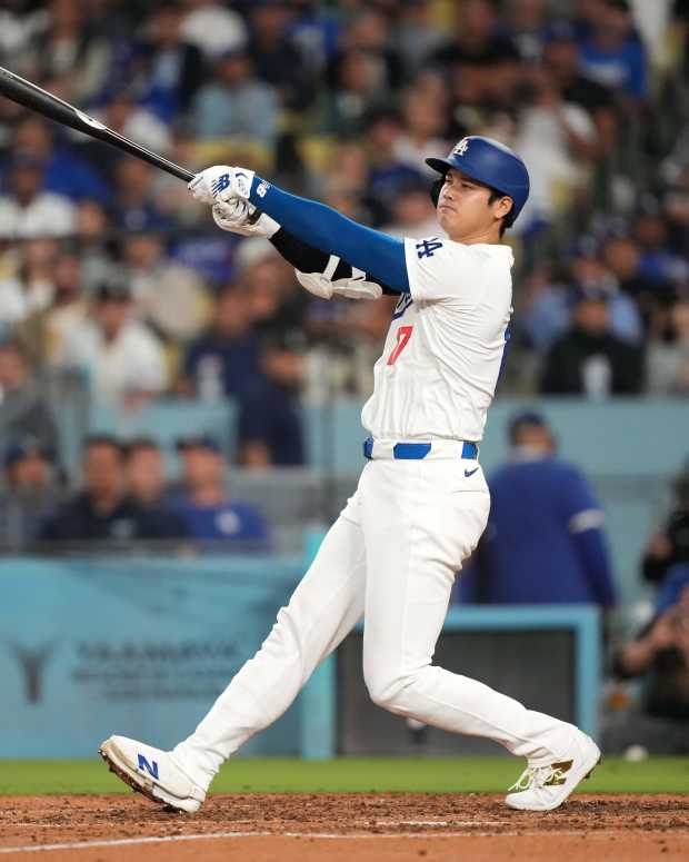 Sep 20, 2024; Los Angeles, California, USA; Los Angeles Dodgers designated hitter Shohei Ohtani (17) singles in the seventh inning against the Colorado Rockies at Dodger Stadium.