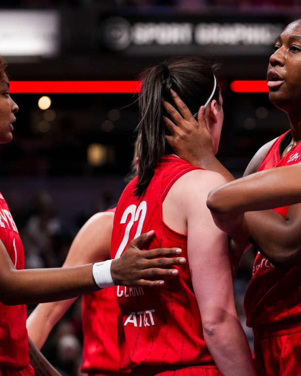 Indiana Fever forward Aliyah Boston hugs guard Caitlin Clark.