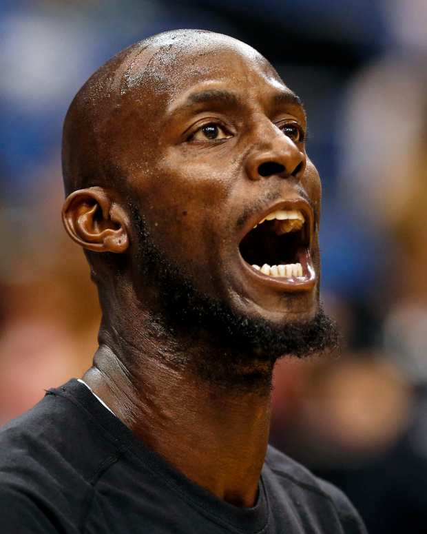 Minnesota Timberwolves forward Kevin Garnett (21) reacts to a shot in warmups before the game with the Milwaukee Bucks at Target Center in 2016.