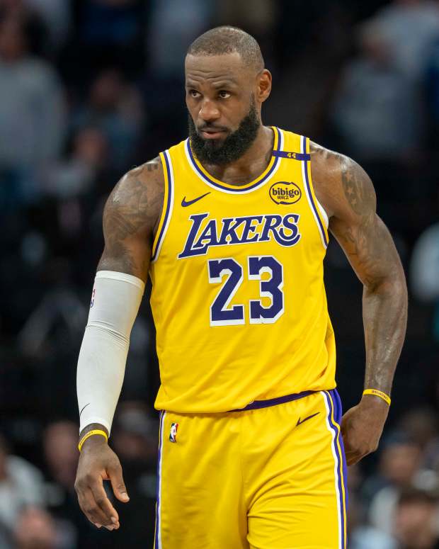 Los Angeles Lakers forward LeBron James (23) looks on during a game.