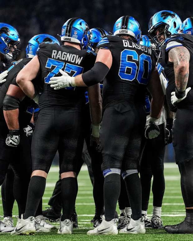 Detroit Lions in a huddle