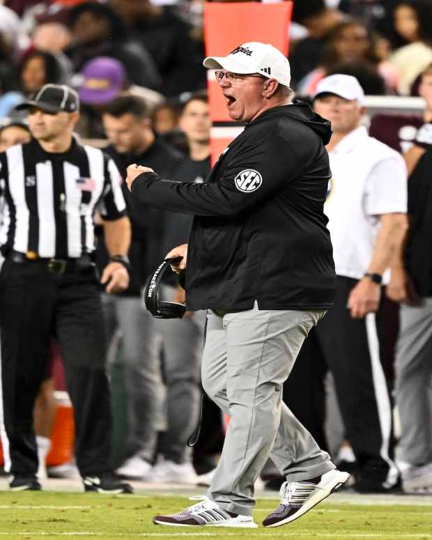 Texas A&M Aggies head coach Mike Elko reacting mid-game