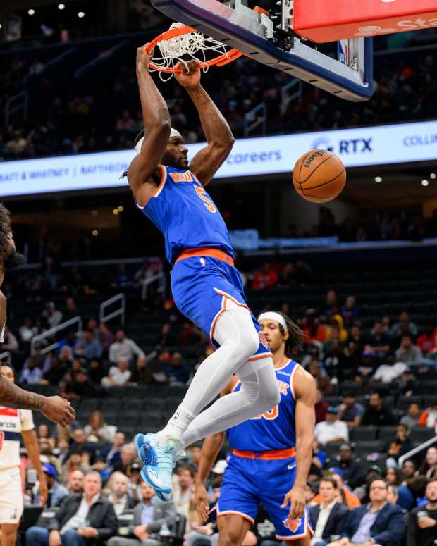 Precious Achiuwa dunking the ball during a preseason game against the Washington Wizards on October 18.