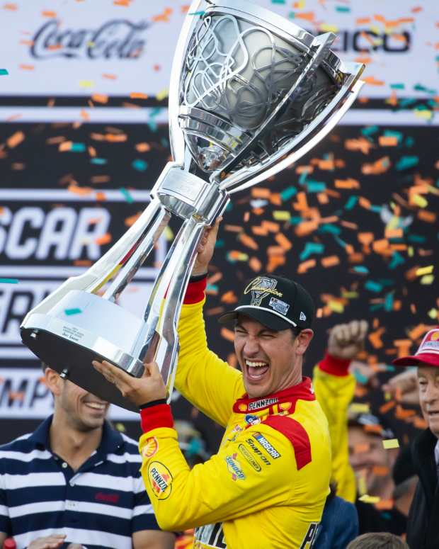 Joey Logano celebrates at Phoenix.