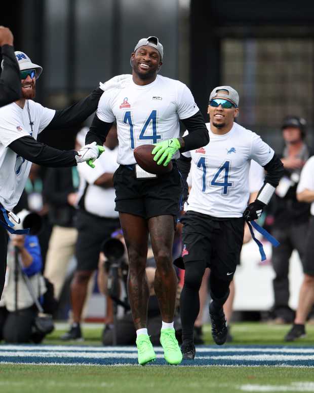 Seattle Seahawks wide receiver DK Metcalf reacts after a touchdown catch at the 2024 Pro Bowl.