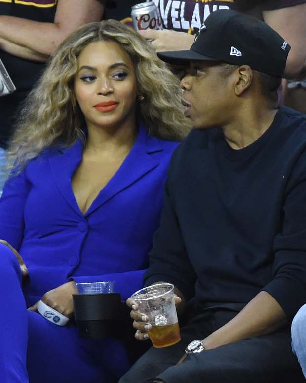 American rapper, entrepreneur and investor Jay Z (R) and American singer, songwriter, record producer and actress Beyonce