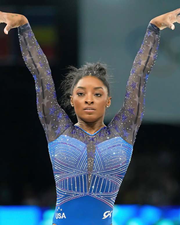 Simone Biles of the United States competes on the beam in the women's gymnastics all-around during the Paris 2024 Olympic Summer Games.