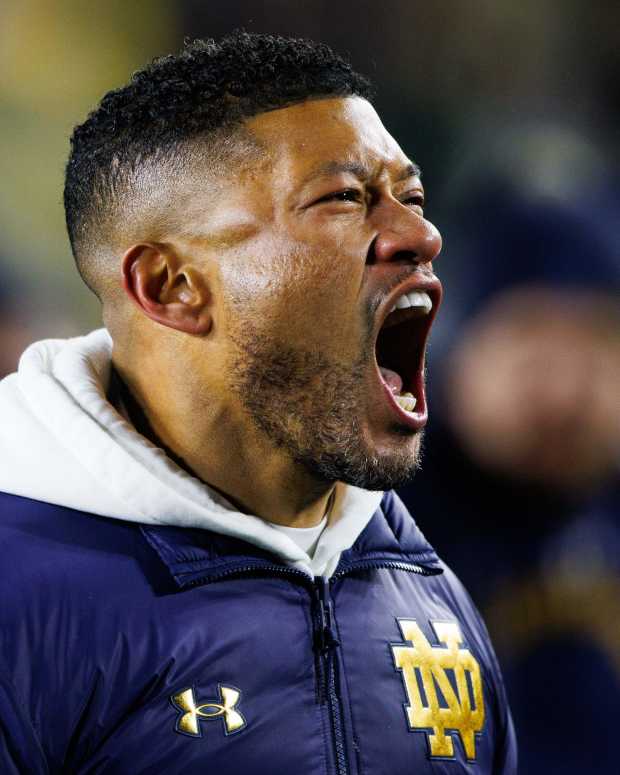 Notre Dame head coach Marcus Freeman celebrates after winning the first round of the College Football Playoff 27-17 against Indiana at Notre Dame Stadium on Friday, Dec. 20, 2024, in South Bend.