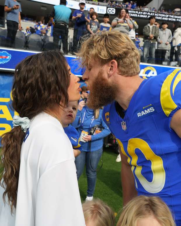 Los Angeles Rams wide receiver Cooper Kupp (10) kisses wife Anna Maria Kupp a at SoFi Stadium.