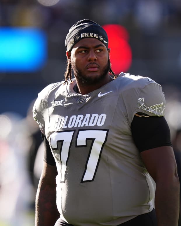 Colorado Buffaloes offensive tackle Jordan Seaton (77).