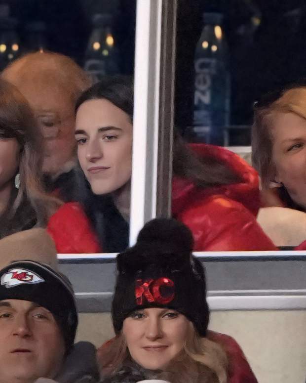 Recording artist Taylor Swift sits with Indiana Fever guard Caitlin Clark during the AFC divisional round at Arrowhead Stadium.